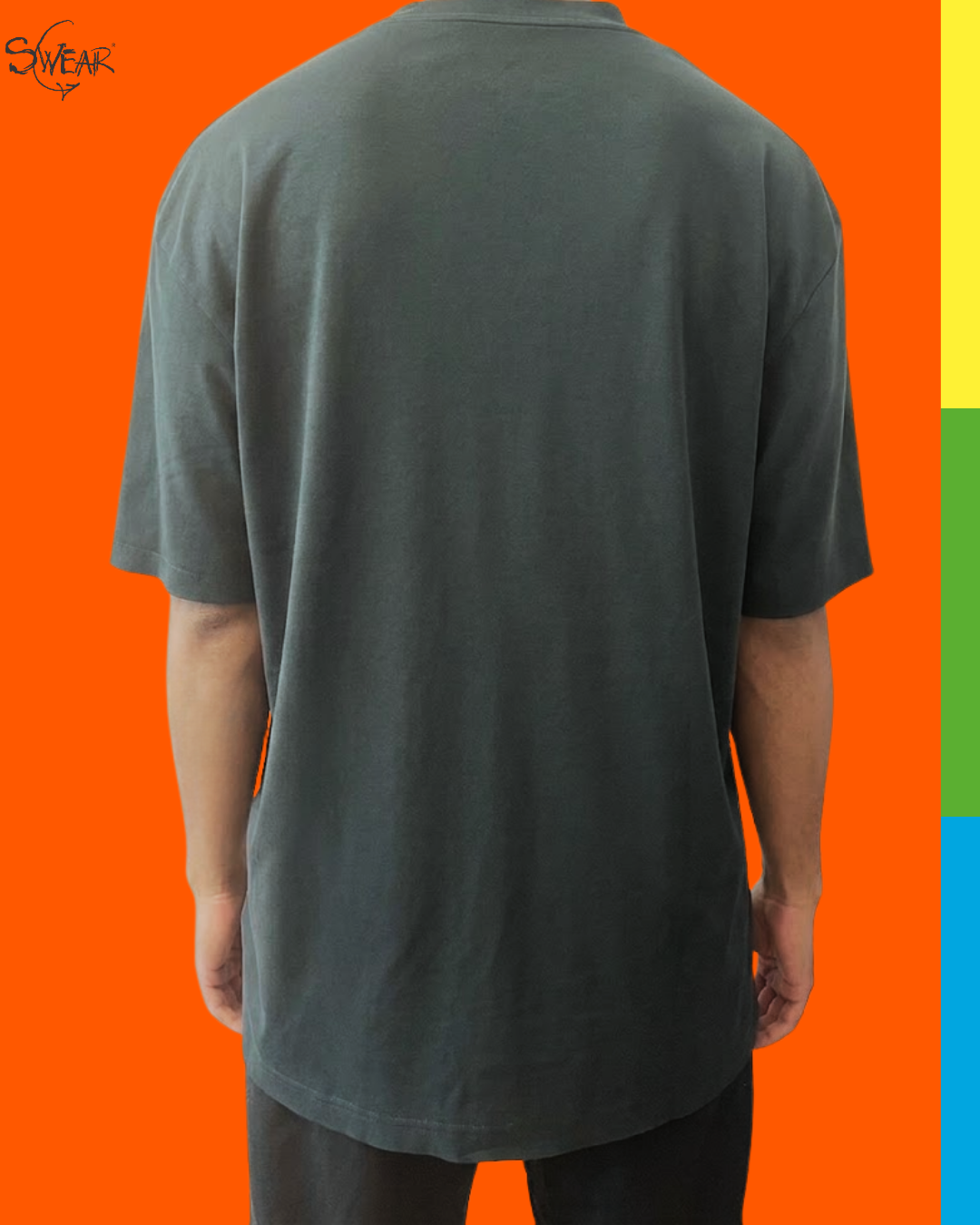 A person shown from the back wearing an oversized dark charcoal gray t-shirt, set against a bright orange background with a vertical multicolor stripe on the right side.